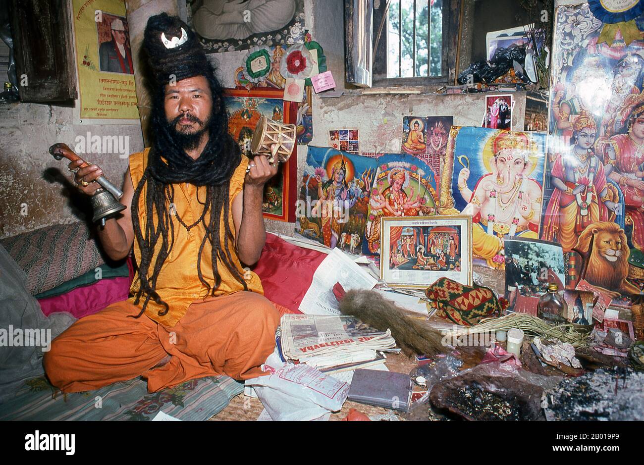Nepal: Shiva Avartari Lama, Pashupatinath, Kathmandu.  They are known, variously, as sadhus (saints, or 'good ones'), yogis (ascetic practitioners), fakirs (ascetic seeker after the Truth) and sannyasins (wandering mendicants and ascetics). They are the ascetic – and often eccentric – practitioners of an austere form of Hinduism. Sworn to cast off earthly desires, some choose to live as anchorites in the wilderness. Others are of a less retiring disposition, especially in the towns and temples of Nepal's Kathmandu Valley. Stock Photo