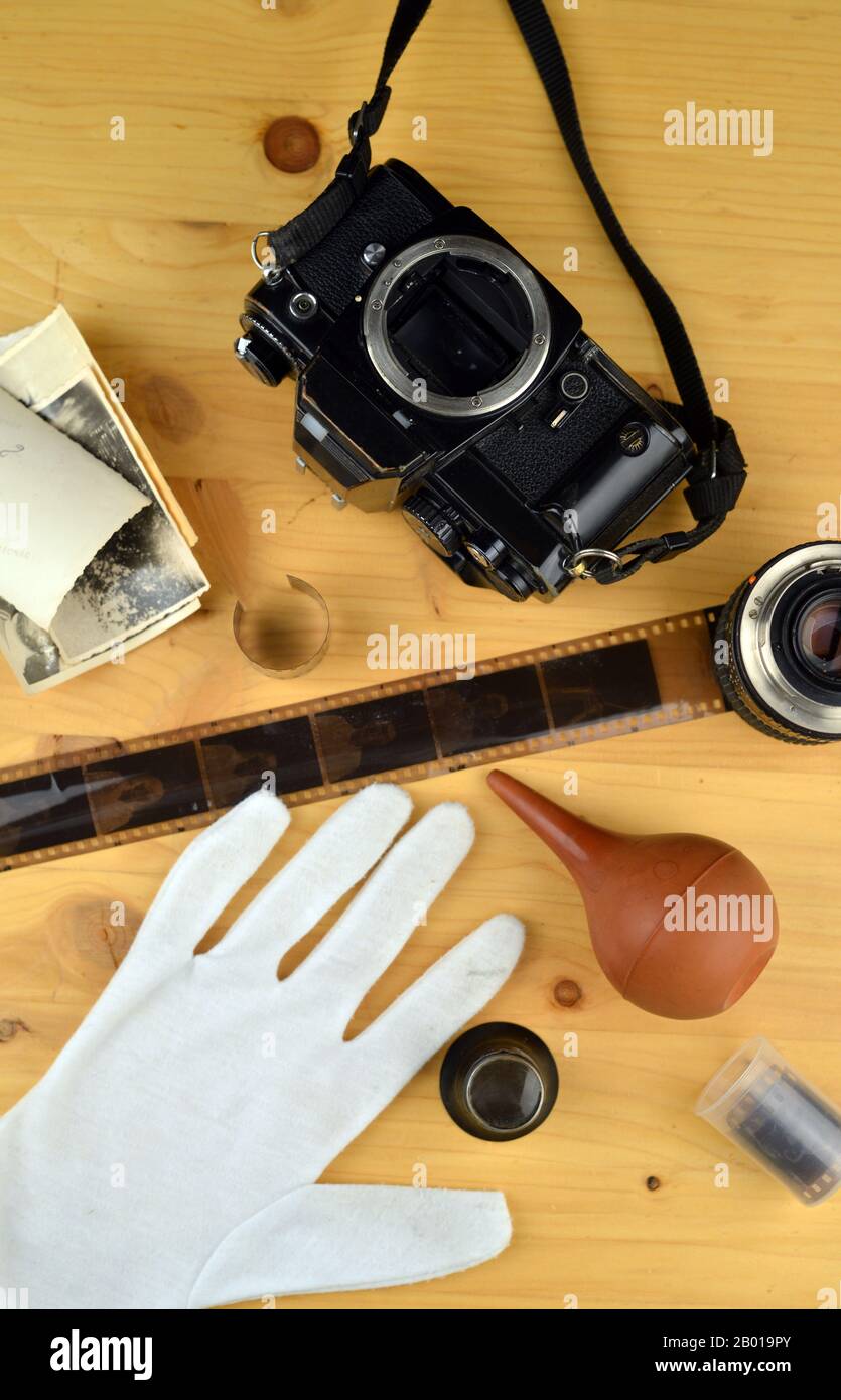 Analog photography concept flat lay vertical with retro camera and photographic equipment and