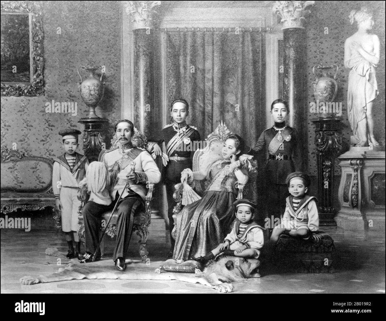 Thailand: King Chulalongkorn (20 September 1853 – 23 October 1910) of Siam with Queen Saowabha and royal children, c. 1890.  Phra Bat Somdet Phra Poramintharamaha Chulalongkorn Phra Chunla Chom Klao Chao Yu Hua, or Rama V, was the fifth monarch of Siam under the House of Chakri.  He is considered one of the greatest kings of Siam. His reign was characterised by the modernisation of Siam, immense government and social reforms, and territorial cessions to the British Empire and French Indochina.  He is seen here with Queen Saowabha (1864-1919), who bore him nine children, including two kings. Stock Photo