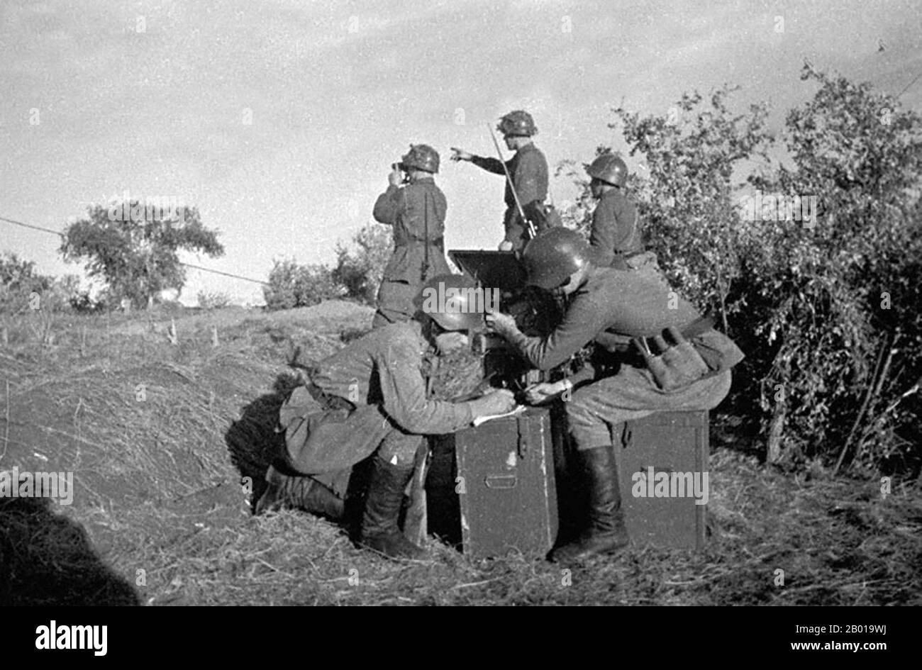 Mongolia: Soviet artillery spotters at an observation post, Khalkhin Gol, 1939.  The Battles of Khalkhin Gol were the decisive engagements of the undeclared Soviet-Japanese Border War fought between the Soviet Union, Mongolia and Japan in 1939. They were named after the river Khalkhin Gol, which passes through the battlefield. In Japan, the decisive battle of the conflict is known as the Nomonhan Incident (Nomonhan Jiken) after a nearby village, and was a total defeat for their army. Stock Photo