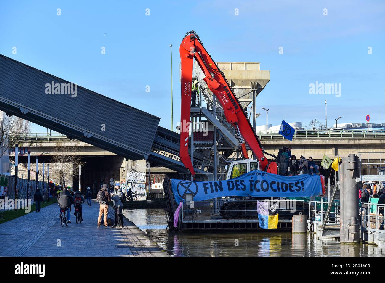 Group of young activists called 'Extinction Rebellion' protesting against ecocides by the blockade of the cement factory site of Lafarge company . Stock Photo