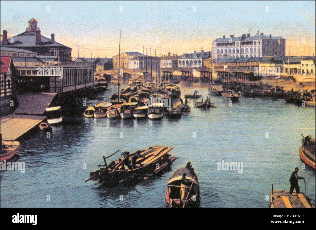 China: Suzhou Creek and Shanghai Rowing Club. Postcard, c. 1920.  Suzhou Creek (also called Wusong River) is a river in China that passes through the Shanghai city centre. It is named after Suzhou, a city in neighbouring Jiangsu province which was the predominant city in this area prior to the rise of Shanghai as a metropolis.  One of the principal outlets of Lake Tai, Suzhou Creek has a length of 125 km, of which 54 km are within the administrative region of Shanghai and 24 km within the city's highly urbanized parts. The river flows into the Huangpu River at the northern end of the Bund. Stock Photo