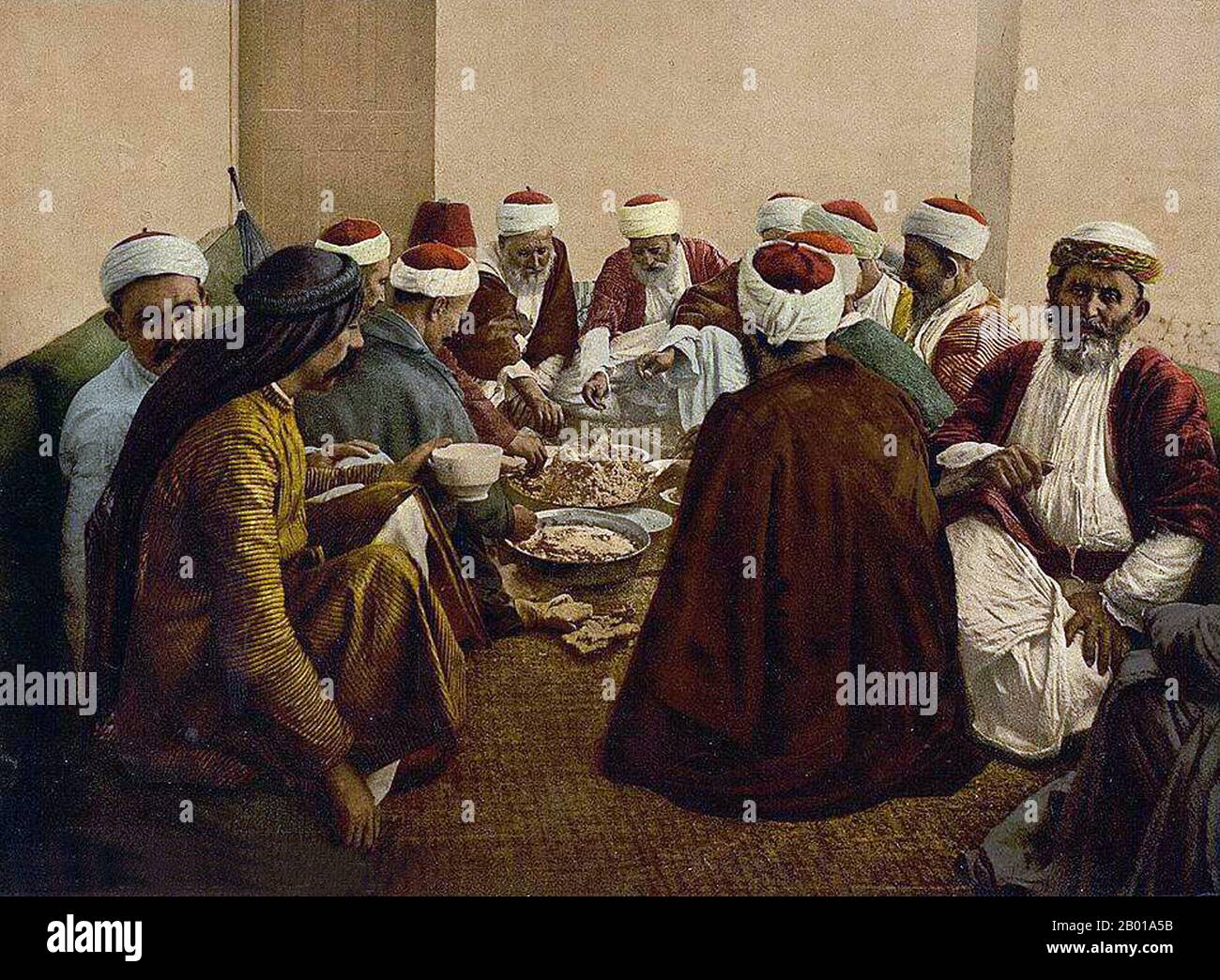 Palestine/Israel: Druze farmers of Mount Carmel sharing a meal. Photo by Felix Adrien Bonfils (8 March 1831 – 9 April 1885), 1880s.  The Druze (Arabic: derzī or durzī, plural durūz, Hebrew: druzim) are an esoteric, monotheistic religious community found primarily in Syria, Lebanon, Israel and Jordan, which emerged during the 11th century from Ismailism, that incorporated several elements of Gnosticism, Neoplatonism and other philosophies. The Druze call themselves Ahl al-Tawhid (People of Unitarianism or Monotheism) or al-Muwaḥḥidūn (Unitarians, Monotheists). Stock Photo