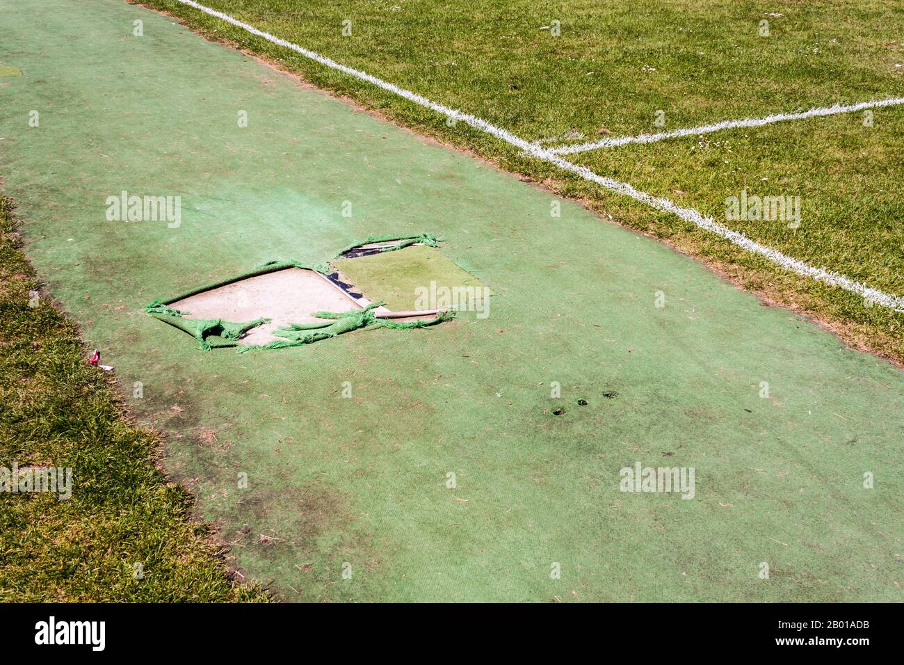 Cricket pitch as public amenity on local leisure facility sports ground. Stock Photo
