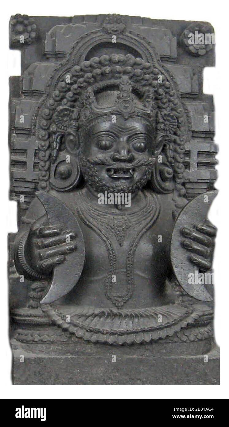 India: Stone carving of Rahu, Snake Demon and causer of solar and lunar eclipses. Photo by Redtigerxyz (CC BY-SA 2.5 License), British Museum.  In Hindu mythology, Rahu is a snake that swallows the sun or the moon causing eclipses. He is depicted in art as a dragon with no body riding a chariot drawn by eight black horses. Rahu is one of the navagrahas (nine planets) in Vedic astrology. The Rahu kala (time of day under the influence of Rahu) is considered inauspicious. Stock Photo