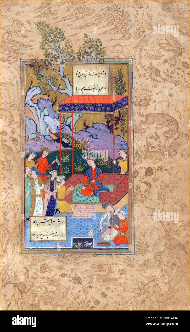 Iran: Page from an illuminated copy of Tuḥfat al-ʻIrāqayn by Afzal al-Dīn Shirvānī Khāqānī (1126-1198), 1604.  This manuscript of Persian poems is written in nastaliq script. The page-borders represent birds and animals in various colours outlined in gold. This is one of three miniatures from the Isfahan School contained in the collection.  The manuscript was produced in 1604 by Shāh Qāsim and is a copy of the original collection of poetry by Khāqānī from the end of the 12th century. Stock Photo