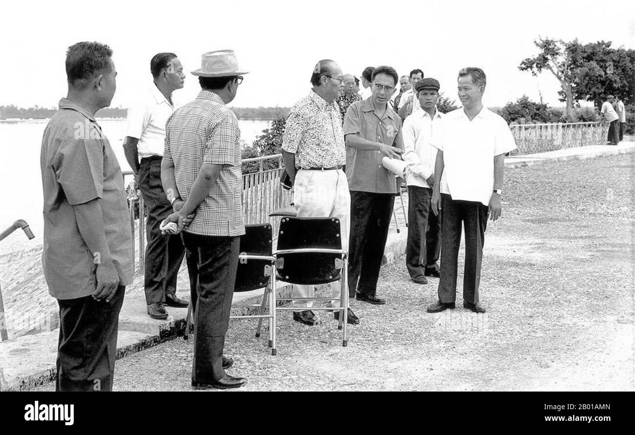 Cambodia: Khieu Samphan (1931-), Defense Minister of Democratic Kampuchea (right) with General Ne Win (c.1910-2002), Burmese military dictator (centre) in Phnom Penh, c. 1976-77.  Khieu Samphan (born July 27, 1931) was the president of the state presidium of Democratic Kampuchea (Cambodia) from 1976 until 1979. As such, he served as Cambodia's head of state and was one of the most powerful officials in the Khmer Rouge movement, though Pol Pot was the group's true political leader and held the most extensive power. Stock Photo