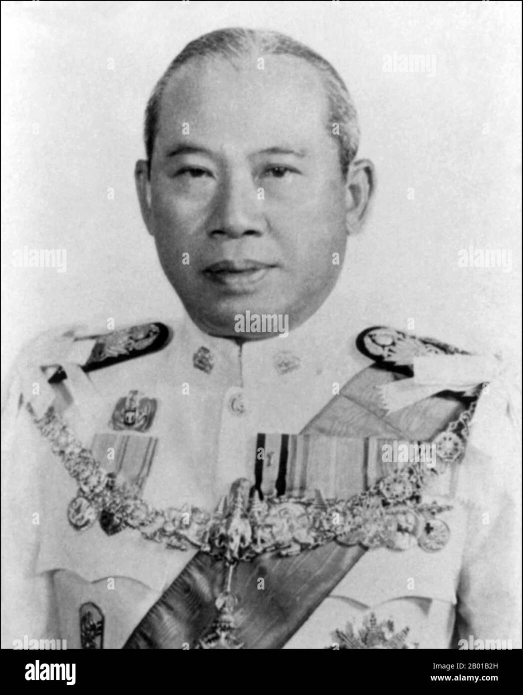 Field Marshal Thanom Kittikachorn (August 11, 1911 - June 16, 2004) was a military dictator of Thailand. A staunch anti-Communist, Thanom oversaw a decade of military rule in Thailand from 1963 to 1973, until public protests which exploded into violence forced him to step down. His return from exile in 1976 sparked protests which led to a massacre of demonstrators, followed by a military coup.  In October 1976, Thanom returned to Thailand as a novice monk at Wat Bowonniwet. His return triggered student protests which took place on the campus of Thammasat University. The far right, aided by gov Stock Photo