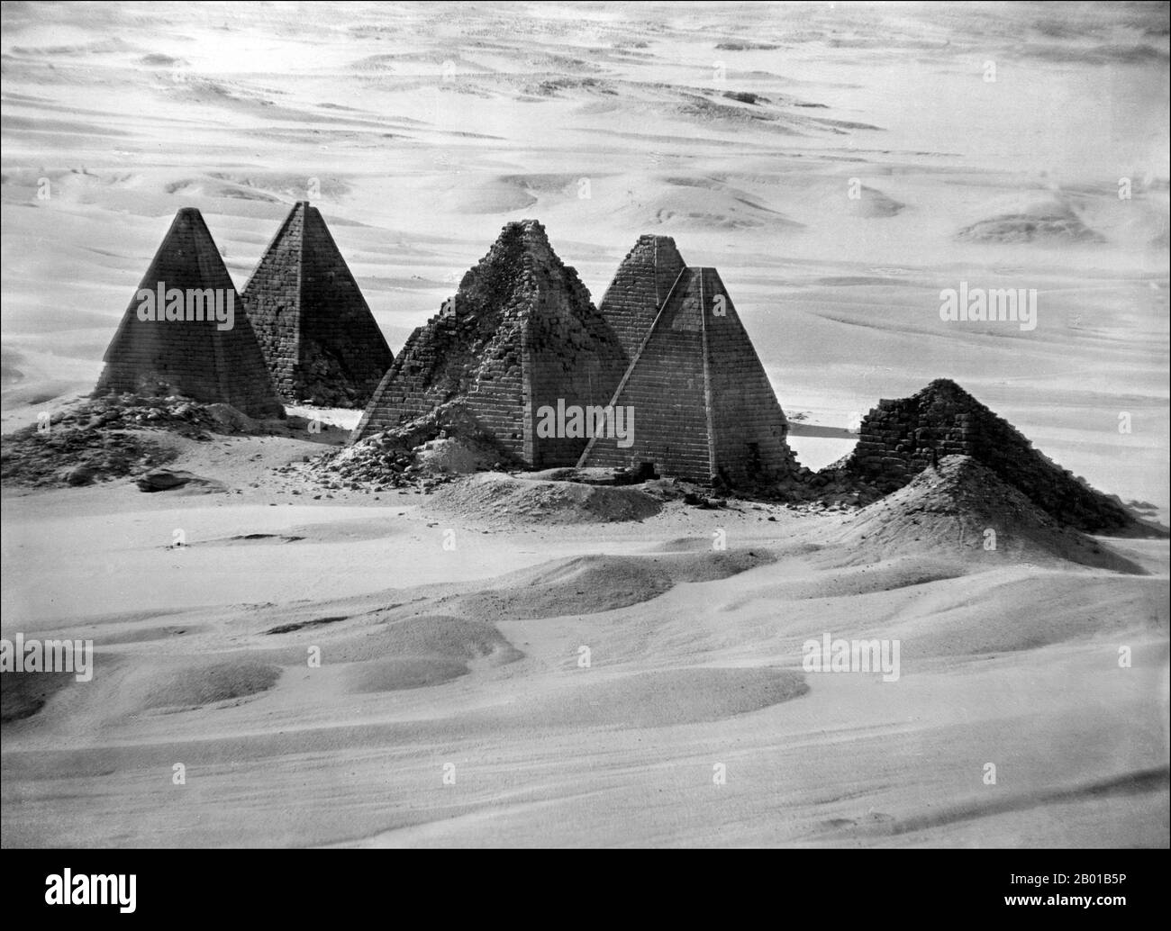 Sudan: Nubian pyramids of the Third Meroitic Period (c. 100 BCE - 150 CE) at Jebel Barkal, 1906.  Meroë (also spelled Meroe) is the name of an ancient city on the east bank of the Nile about 6 km north-east of the Kabushiya station near Shendi, Sudan, approximately 200 km north-east of Khartoum. Near the site are a group of villages called Bagrawiyah. This city was the capital of the Kingdom of Kush for several centuries. Stock Photo
