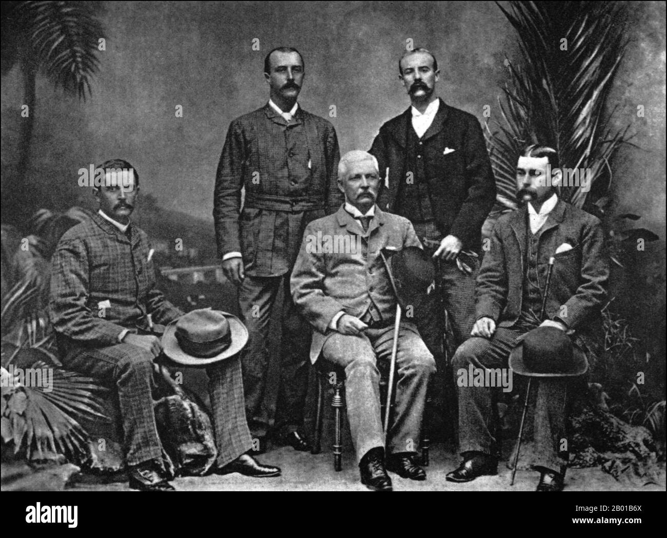 Egypt: Leaders of the Emin Pasha Relief Expedition, with Henry Morton Stanley (28 January 1841 - 10 May 1904) seated centre, Cairo, 1890.  The Emin Pasha Relief Expedition, led by Henry Morton Stanley, was undertaken in 1886 to rescue Emin Pasha, governor of Equatoria, from Madhist forces. The expedition went up the Congo River and then through the Ituri Forest, a very difficult route that resulted in the loss of two-thirds of the expedition.  Stanley met Emin in 1888, and after a year spent in argument and indecision, Emin was convinced to leave for the coast, arriving in Bagamoyo in 1890. Stock Photo