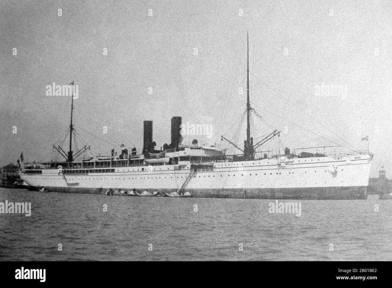 China: The Messageries Maritimes liner 'Tonkin' at anchor in Shanghai, c. 1910.  The Messageries Maritimes is an old French maritime company. It was originally created in 1851 as Messageries Nationales, later called Messageries Impériales, and in 1871, Compagnie des Messageries Maritimes.  From 1871 to 1914, the Compagnie des Messageries Maritimes experienced its Golden Age. This was the period of the colonial expansion and of the French interventionism in the Middle and Far East. In the Far East Saigon became the regional headquarters of the company. Stock Photo