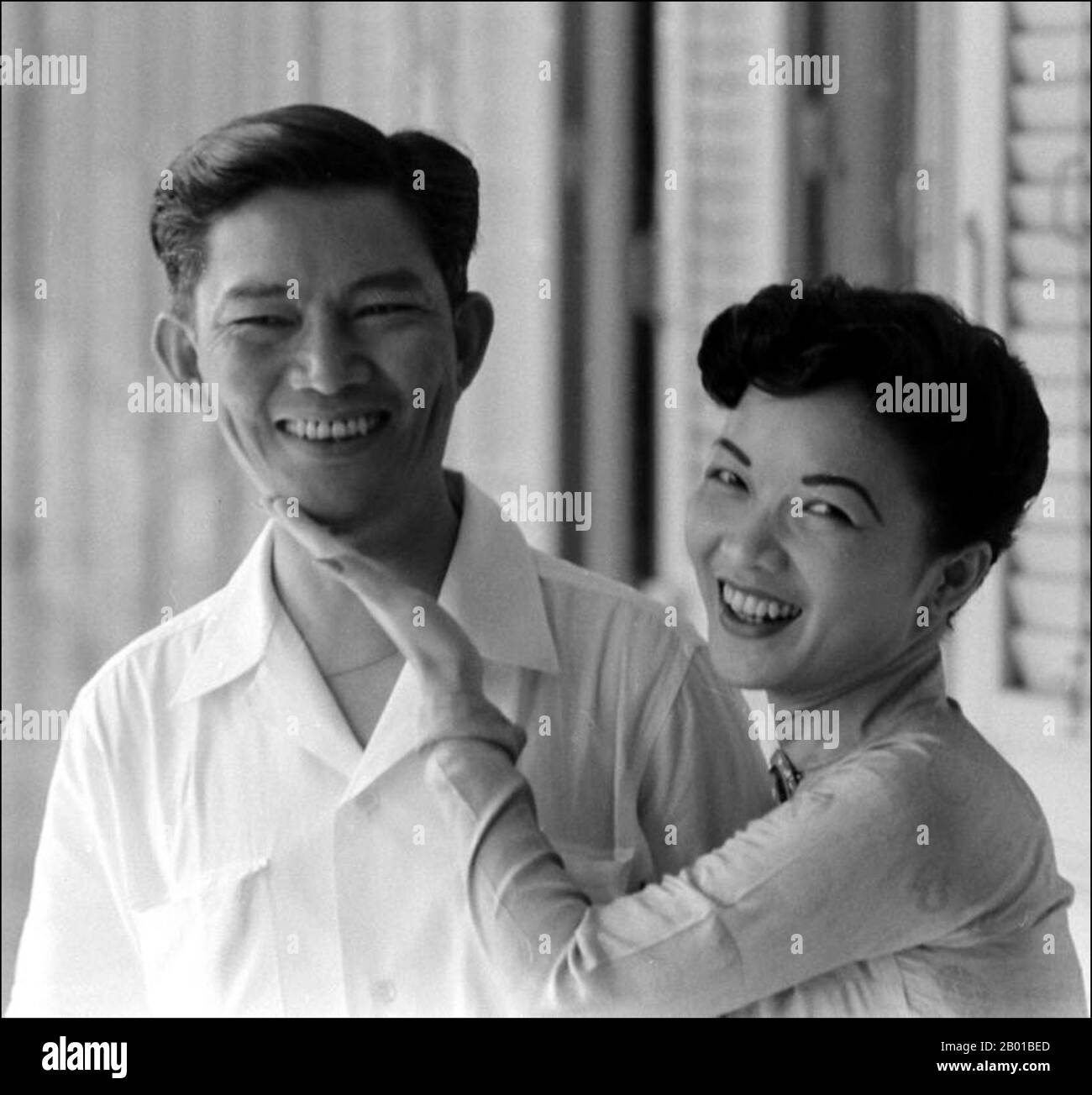 Vietnam: Madame Ngo Dinh Nhu (15 April 1924 - 24 April 2011), First Lady of South Vietnam (r. 1955-1963), with her husband Ngo Dinh Nhu (7 October 1910 - 2 November 1963), brother and chief adviser to President Ngo Dinh Diem, c. 1956.  Tran Le Xuan, popularly known as Madame Nhu but more properly Madame Ngo Dinh Nhu, was considered the First Lady of South Vietnam from 1955 to 1963. She was the wife of Ngo Dinh Nhu, brother and chief adviser to President Ngo Dinh Diem. As Diem was a lifelong bachelor, and because the Nhus lived in the Independence Palace, she was considered to be the First Lady Stock Photo