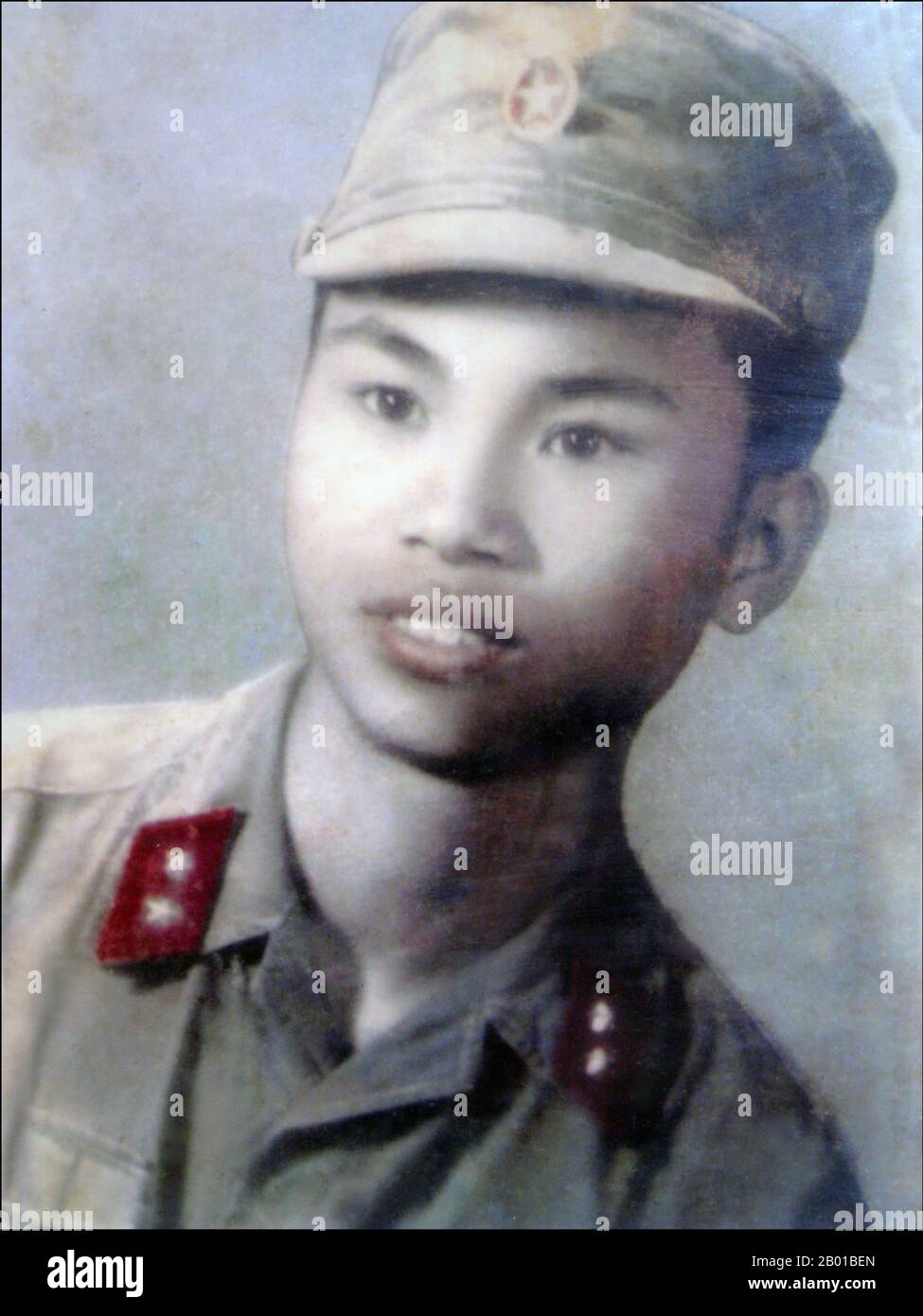 Vietnam: Memorial photograph of a young revolutionary soldier killed in or around the time of the Tet Offensive, 1968.  Cemeteries for fallen communist  'martyrs' (liệt sĩ) are to be found across Vietnam, both in the former north and south. Soldiers of the former Armed Forces of the Republic of Vietnam (South Vietnam) or ARVN, received no such posthumous honours. Stock Photo