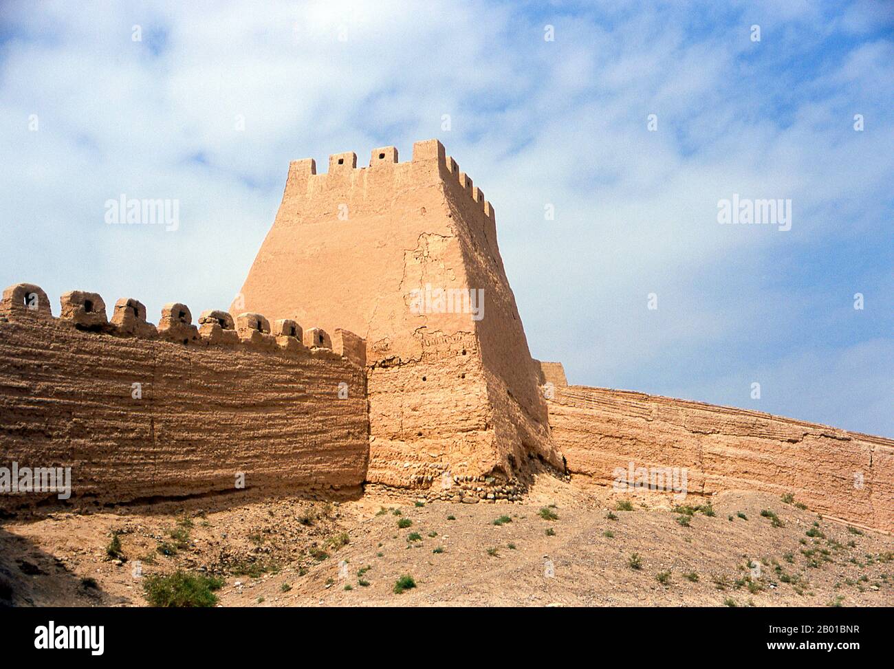 China: Outer wall tower next to the front gate, Jiayuguan Fort, Jiayuguan, Gansu.  Jiayuguan, the ‘First and Greatest Pass under Heaven’, was completed in 1372 on the orders of Zhu Yuanzhang, the first Ming Emperor (1368-98), to mark the end of the Ming Great Wall. It was also the very limits of Chinese civilisation, and the beginnings of the outer ‘barbarian’ lands.  For centuries the fort was not just of strategic importance to Han Chinese, but of cultural significance as well. This was the last civilised place before the outer darkness, and those proceeding beyond faced a life of exile. Stock Photo
