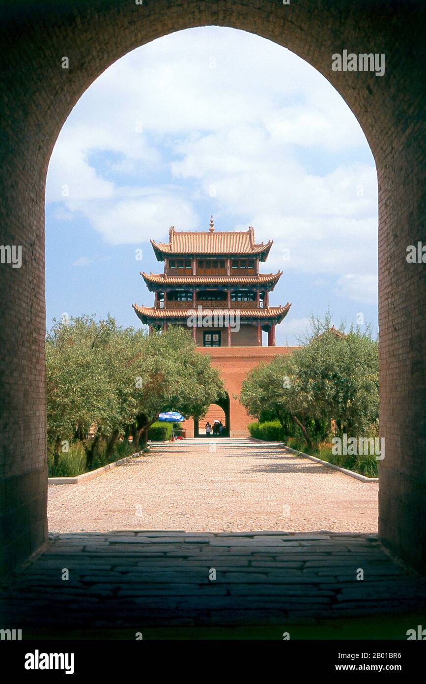 China: Guanghua Men (Gate of Enlightenment), Jiayuguan Fort, Jiayuguan, Gansu.  Jiayuguan, the ‘First and Greatest Pass under Heaven’, was completed in 1372 on the orders of Zhu Yuanzhang, the first Ming Emperor (1368-98), to mark the end of the Ming Great Wall. It was also the very limits of Chinese civilisation, and the beginnings of the outer ‘barbarian’ lands.  For centuries the fort was not just of strategic importance to Han Chinese, but of cultural significance as well. This was the last civilised place before the outer darkness, and those proceeding beyond faced a life of exile. Stock Photo