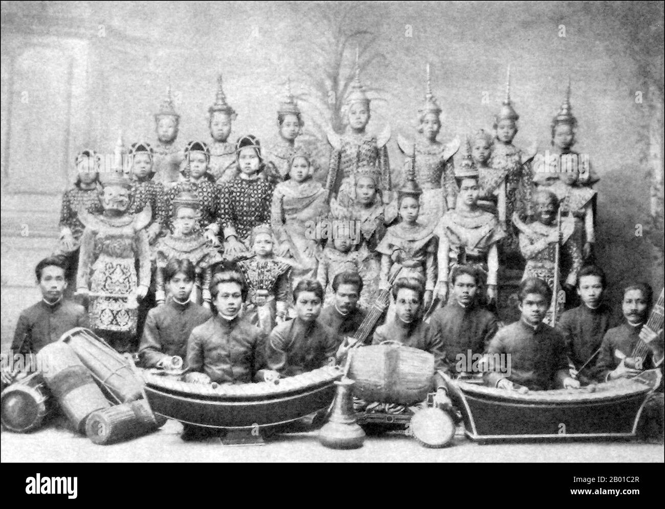 Thailand: An orchestra at the Siamese Court, Bangkok, prior to their departure to Berlin, c. 1900.  Thai classical music is synonymous with those stylised court ensembles and repertoires that emerged in its present form within the royal centers of Central Thailand some 800 years ago. These ensembles, while being deeply influenced by Khmer and even older practices and repertoires from India, are today uniquely Thai expressions. Stock Photo