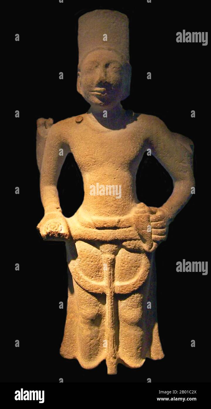 Vietnam: A statue of Vishnu from Oc Eo, An Giang province, 6th-7th century CE.  Óc Eo is an archaeological site in Thoại Sơn District in southern An Giang Province, Vietnam, in the Mekong River Delta region of Vietnam. It is also one of the modern day communes of Vietnam. Óc Eo may have been a busy port of the kingdom of Funan between the 1st and 7th centuries AD. Scholars use the term 'Óc Eo Culture' to refer to the ancient material culture of the Mekong Delta region that is typified by the artifacts recovered at Óc Eo through archeological investigation. Stock Photo