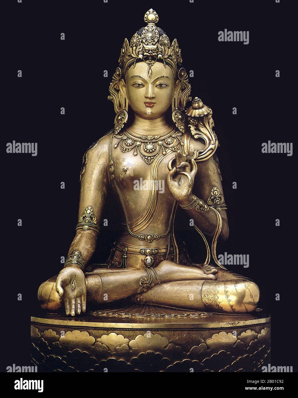 Mongolia: Gilt copper figurine of White Tara, 17th century.  Tara, also known as Jetsun Dolma (Tibetan: rje btsun sgrol ma) in Tibetan Buddhism, is a female Bodhisattva in Mahayana Buddhism who appears as a female Buddha in Vajrayana Buddhism. She is known as the 'mother of liberation', and represents the virtues of success in work and achievements. In Japan she is known as Tarani Bosatsu, and as Tuoluo in Chinese Buddhism.  Tara is a tantric meditation deity whose practice is used by practitioners of the Tibetan branch of Vajrayana Buddhism to develop certain inner qualities. Stock Photo