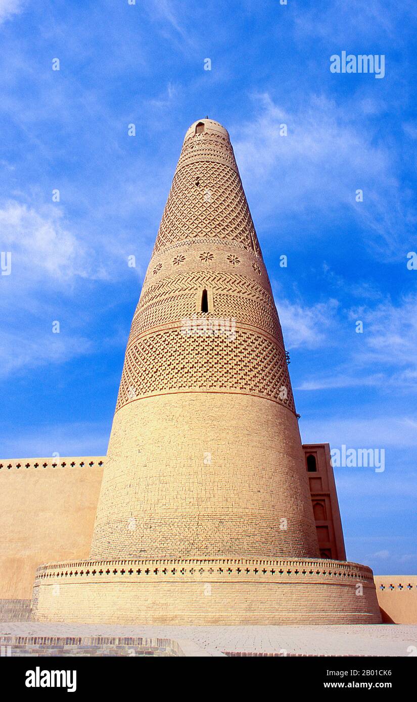 The Emin Minaret or Imin Ta is 44 meters (144 ft) high and is the tallest minaret in China. The minaret was started in 1777 during the reign of the Qing Emperor Qianlong (1735–1796) and was completed only one year later. It was financed by local leaders and built to honor the exploits of a local Turpan general, Emin Khoja, hence the name 'Emin'.  The Turpan Oasis was a strategically significant centre on Xinjiang’s Northern Silk Route, site of the ancient cities of Yarkhoto (Jiaohe) and Karakhoja (Gaochang). Chinese armies first entered Turpan in the 2nd century BC, during the reign of Han Emp Stock Photo