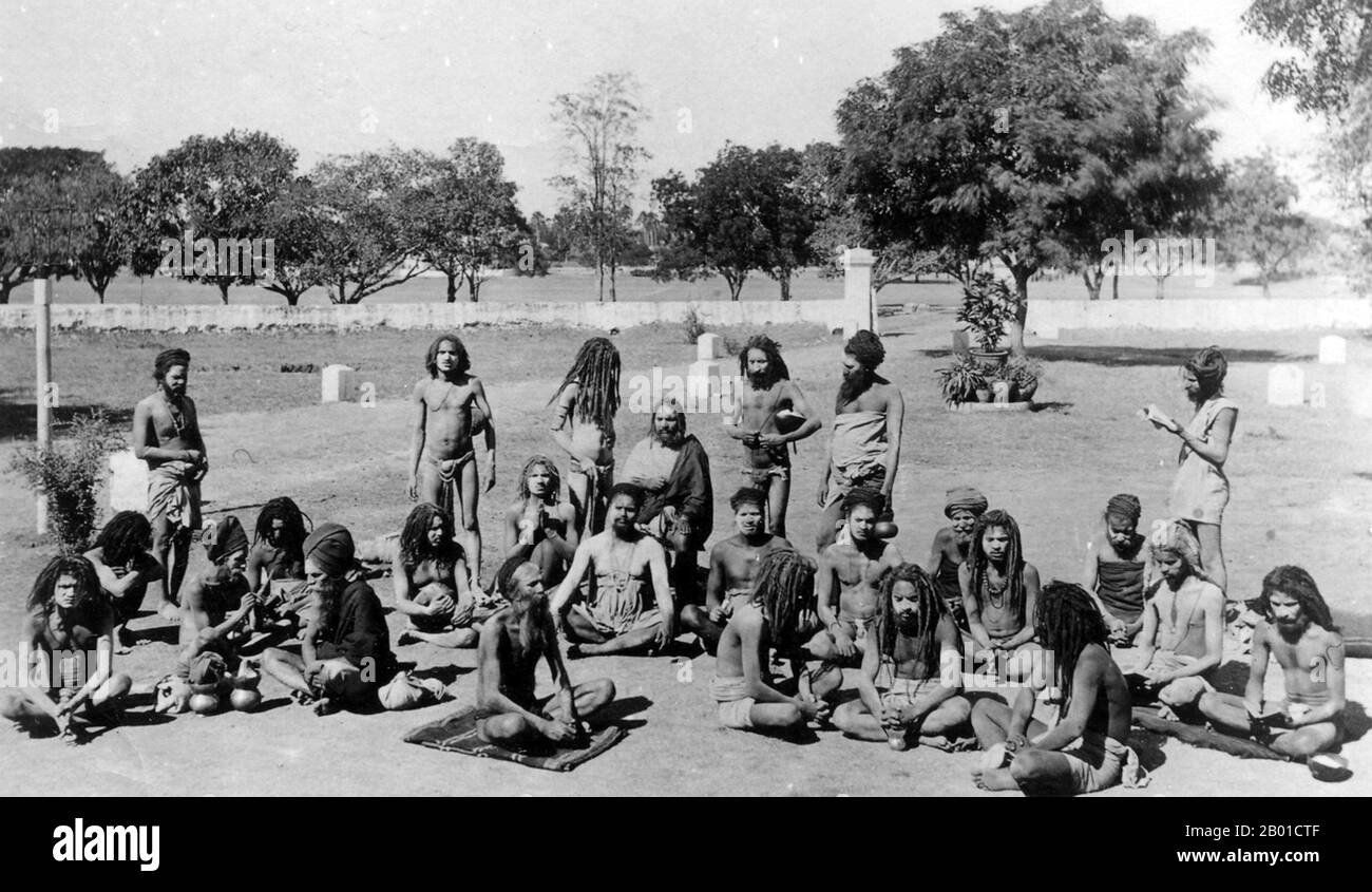 India: A gathering of sadhus or sannyasin somehwere in north India, c. 1890.  Sannyasa is the order of life of the renouncer within the Hindu scheme of āśramas, or life stages. It is considered the topmost and final stage of the ashram systems and is traditionally taken by men or women at or beyond the age of fifty years old or by young monks who wish to renounce worldly and materialistic pursuits and instead dedicate their entire life towards spiritual pursuits.  In this phase of life, the person develops vairāgya, or a state of dispassion and detachment from material life. Stock Photo