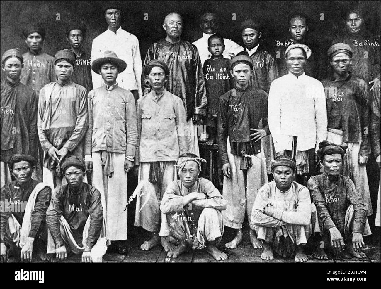 Vietnam: De Tham (1858-1913), Vietnamese patriot and anti-colonialist, together with members of his guerrilla band, duly labelled where possible by agents of the French security, c. 1900.  Đề Thám, born Đoàn Văn Nghĩa and also called Hoàng Hoa Thám or Commander Thám, was a Vietnamese resistance fighter and enemy of French colonialism during the first two decades of French rule in Indochina. A Feudal lord from Yên Thế, he led the Yên Thế Insurrection that fought off the French protectorate in Tonkin for thirty years. He was eventually assassinated by a French agent. Stock Photo