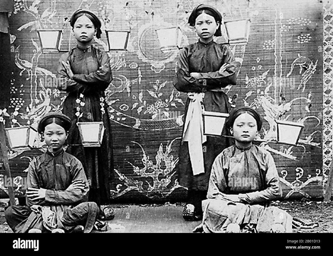 Vietnam: A group of four dancers, Tonkin, c. 1905.  Ca trù, also known as hát cô đầu or hát nói, is a genre of musical storytelling from northern Vietnam, performed by a featuring female vocalist. It combined entertaining wealthy clients with performing religious songs for the royal court.  Traditional Vietnamese dance includes several different forms. These include: dance as performed in Vietnamese theatre and opera, dances performed at festivals, and royal dances of the imperial court. Dance is thought to have been an integral part of Vietnamese culture since ancient times. Stock Photo