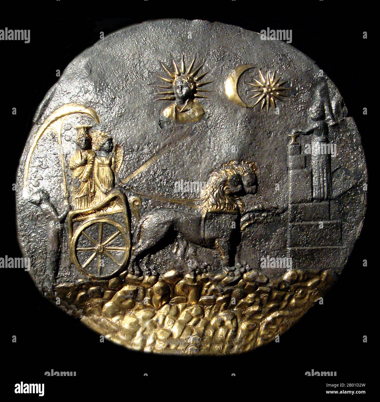 Afghanistan: A plate depicting Cybele and Nike being pulled by lions, a votive sacrifice and the Sun God Helios. Ai Khanoum, 3rd century BCE.  Ai-Khanoum or Ay Khanum ( 'Lady of the Moon' in Uzbek, probably the historical Alexandria on the Oxus, also possibly named Eucratidia), was founded in the 4th century BCE, following the conquests of Alexander the Great and was one of the primary cities of the Greco-Bactrian kingdom.  The city is located in Kunduz Province northern Afghanistan, at the confluence of the Oxus river (today's Amu Darya) and the Kokcha river. Stock Photo