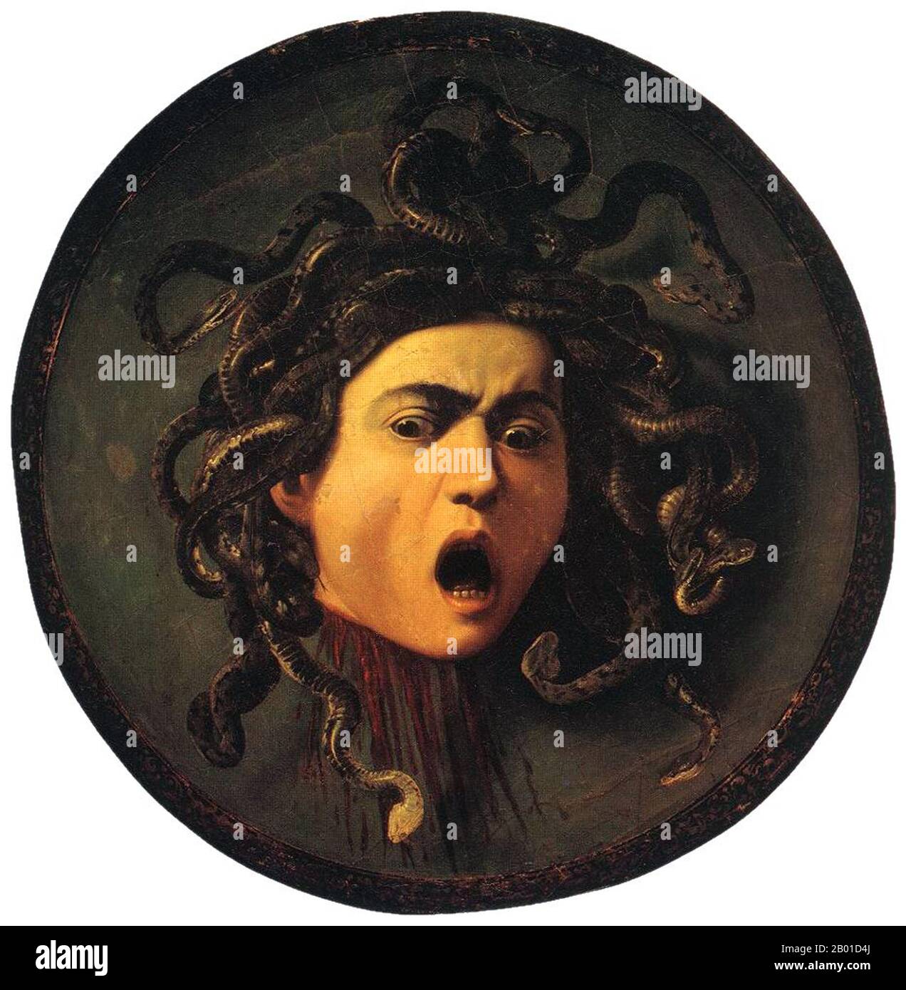 Italy: Medusa as the shield of Athena. Oil on canvas painting by Michelangelo Merisi da Caravaggio (29 September 1571 - 18 July 1610), c. 1597.  In Greek mythology Medusa (Greek: Μέδουσα, 'guardian, protectress') was a Gorgon, a chthonic monster, and a daughter of Phorcys and Ceto. Gazing directly upon her would turn onlookers to stone.  She was beheaded by the hero Perseus, who thereafter used her head as a weapon until he gave it to the goddess Athena to place on her shield. In classical antiquity the image of the head of Medusa appeared in the evil-averting device known as the Gorgoneion. Stock Photo