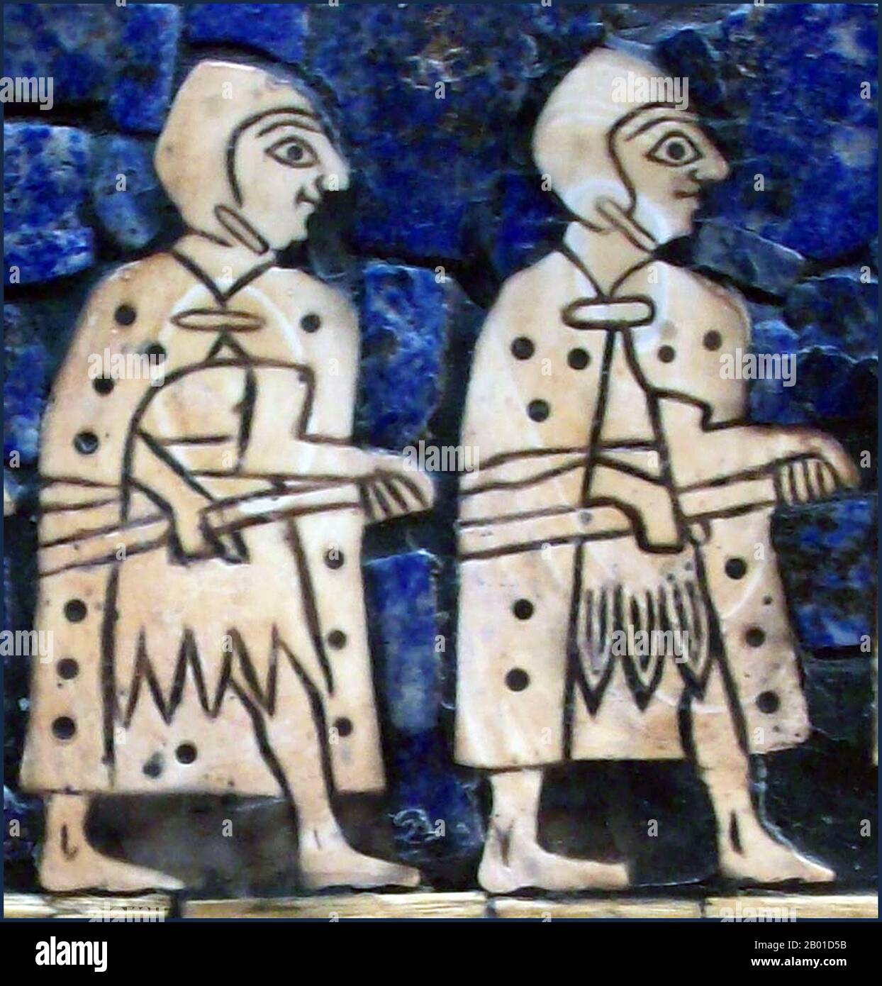 Iraq: Detail from the war side of the Standard of Ur (also known as the 'Battle Standard of Ur', or the 'Royal Standard of Ur') depicting two soldiers, a Sumerian artifact excavated from the Royal Cemetery in the ancient city of Ur, located in modern-day Iraq to the south of Baghdad, c. 2600 BCE.  The Standard of Ur survived in only a fragmentary condition, as the effects of time over the last several millennia had decayed the wooden frame and bitumen glue which had cemented the mosaic in place. The weight of the soil had crushed the object, fragmenting it and breaking the end panels. Stock Photo