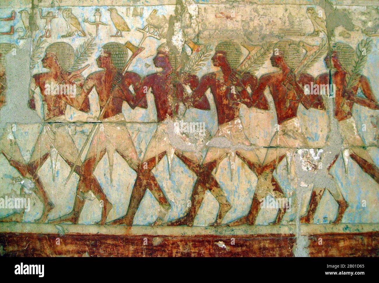 Egypt: Soldiers from Queen Hatshepsut's expedition to the Land of Punt as depicted from her temple at Deir el-Bahri, c. 1480 BCE. Photo by Σταύρος (CC BY 2.0 License).  Hatshepsut established the trade networks that had been disrupted during the Hyksos occupation of Egypt during the Second Intermediate Period, thereby building the wealth of the eighteenth dynasty.  She oversaw the preparations and funding for a mission to the Land of Punt. The expedition set out in her name with five ships, each measuring 70 feet (21 m) long bearing several sails and accommodating 210 men. Stock Photo