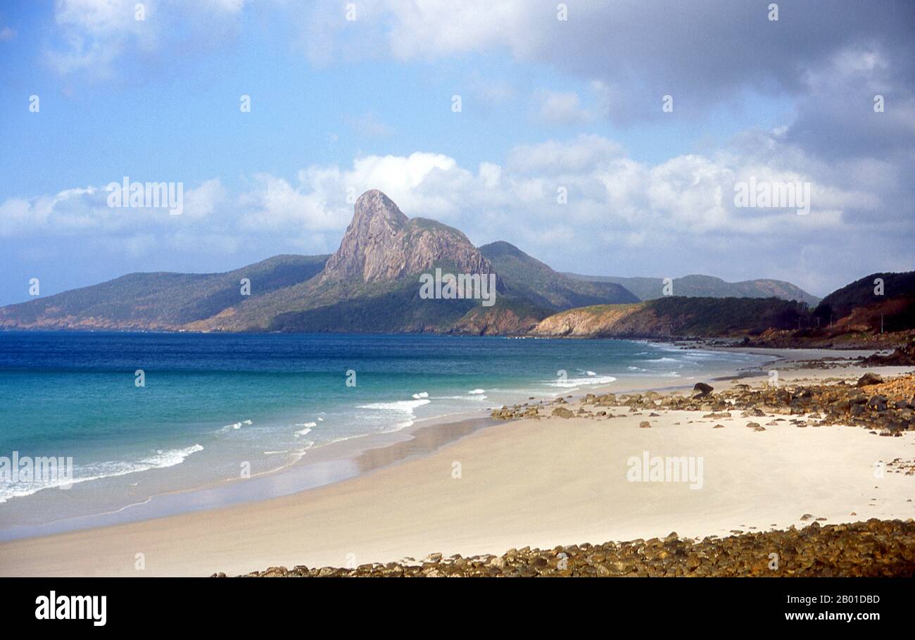 Vietnam: Looking towards the Peak of Love, Con Son Island, Con Dao National Park, Con Dao Archipelago.  The Con Dao Islands (Vietnamese: Côn Đảo) are an archipelago of Bà Rịa–Vũng Tàu Province, in southeastern Vietnam, and are a district of this province. Situated at about 185 km (115 mi) from Vũng Tàu and 230 km (143 mi) from Hồ Chí Minh City (Saigon), the group includes 16 mountainous islands and islets. The total land area is 75 sq km, and the local population is about 5,000. The island group is served by Cỏ Ống Airport.  The archipelago was formerly known as Poulo Condore. Stock Photo