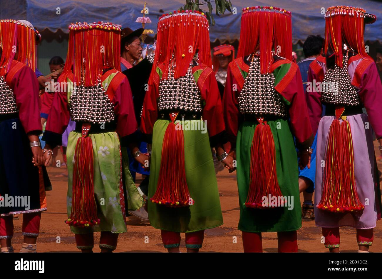 Thailand: Lisu women dress up in silver and fine headdresses for Lisu New Year celebrations, Chiang Mai Province, northern Thailand.  The Lisu people (Lìsù zú) are a Tibeto-Burman ethnic group who inhabit the mountainous regions of Burma (Myanmar), Southwest China, Thailand, and the Indian state of Arunachal Pradesh.  About 730,000 live in Lijiang, Baoshan, Nujiang, Diqing and Dehong prefectures in Yunnan Province, China. The Lisu form one of the 56 ethnic groups officially recognised by the People's Republic of China. In Burma, the Lisu are known as one of the seven Kachin minority groups. Stock Photo