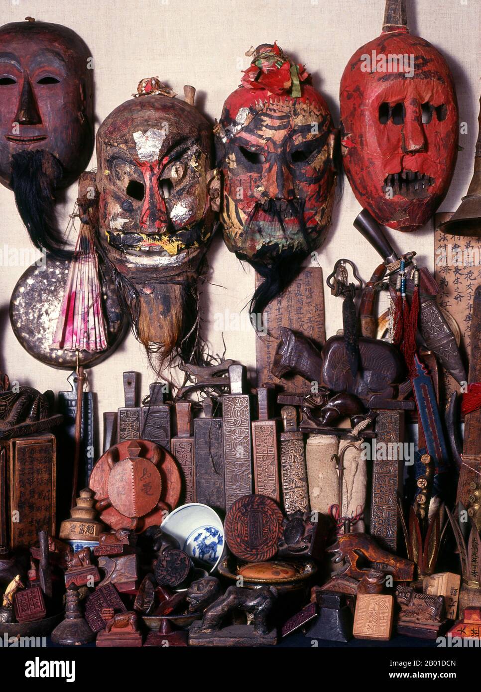 Thailand/China: Yao shaman's masks and other shaman paraphernalia from northern Thailand.  The Yao nationality (its great majority branch is also known as Mien; Pinyin: Yáo zú; Vietnamese: người Dao) is a government classification for various minorities in China. They form one of the 55 ethnic minority groups officially recognised by the People's Republic of China, where they reside in the mountainous terrain of the southwest and south.  They also form one of the 54 ethnic groups officially recognised by Vietnam. Stock Photo