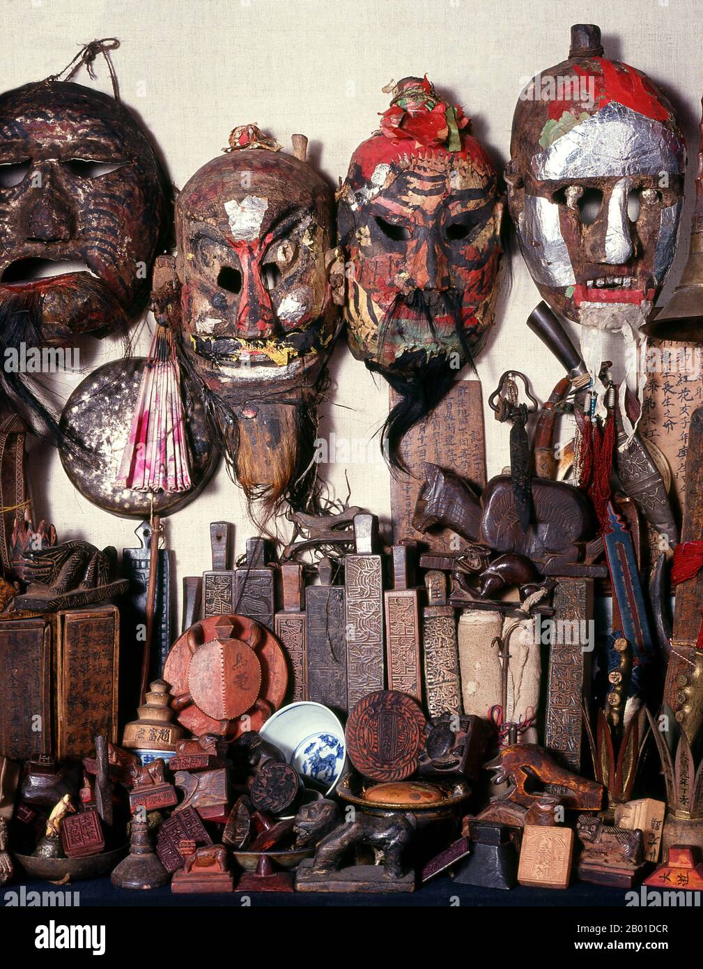 Thailand/China: Yao shaman's masks and other shaman paraphernalia from northern Thailand.  The Yao nationality (its great majority branch is also known as Mien; Pinyin: Yáo zú; Vietnamese: người Dao) is a government classification for various minorities in China. They form one of the 55 ethnic minority groups officially recognised by the People's Republic of China, where they reside in the mountainous terrain of the southwest and south.  They also form one of the 54 ethnic groups officially recognised by Vietnam. Stock Photo