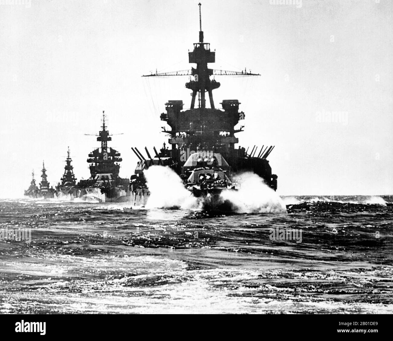USA/Japan: USS Pennsylvania, USS Colorado, USS Louisville, USS Portland and USS Columbia enter Lingayen Gulf, Philippines, January 1945.  The battleship USS Pennsylvania leads USS Colorado, USS Louisville, USS Portland, and USS Columbia into Lingayen Gulf before the landing on Luzon, Philippines in January 1945. Battleships and other big gun naval vessels that served in the Pacific Theatre during World War II were used primarily for offshore bombardment of enemy positions and as anti-aircraft screens for aircraft carriers. Stock Photo