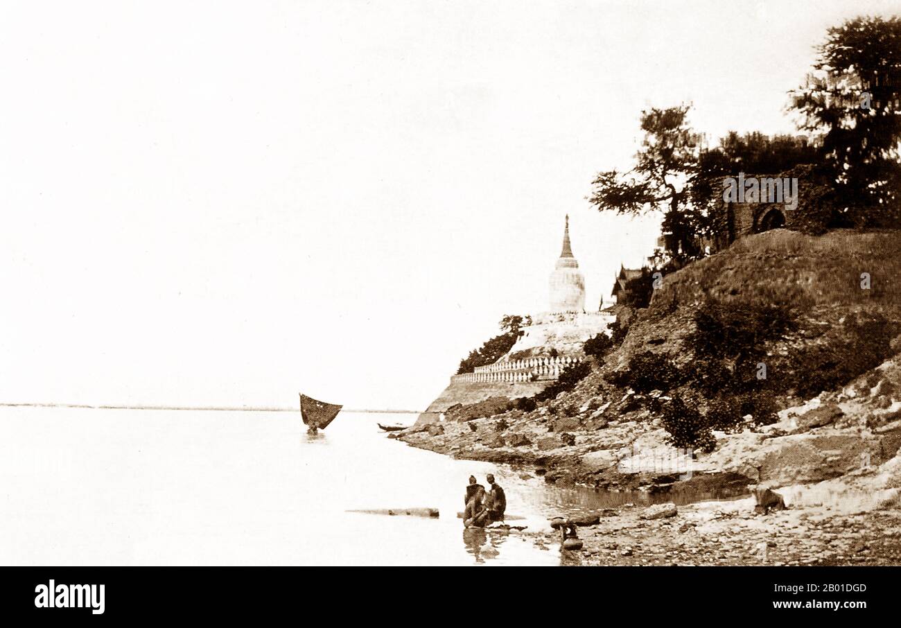 Burma: A bathing spot by the Irrawaddy River near Bagan, c. 1892-1896.  The ruins of Bagan (also spelled Pagan) cover an area of 16 square miles (41 km2). The majority of its buildings were built between the 11th and 13th centuries, during the time Bagan was the capital of the First Burmese Empire. However, it was not until King Pyinbya moved the capital to Bagan in 874 CE that it became a major city.  In Burmese tradition, the capital shifted with each reign, and thus Bagan was once again abandoned until the reign of King Anawrahta who, in 1057, conquered the Mon capital of Thaton. Stock Photo