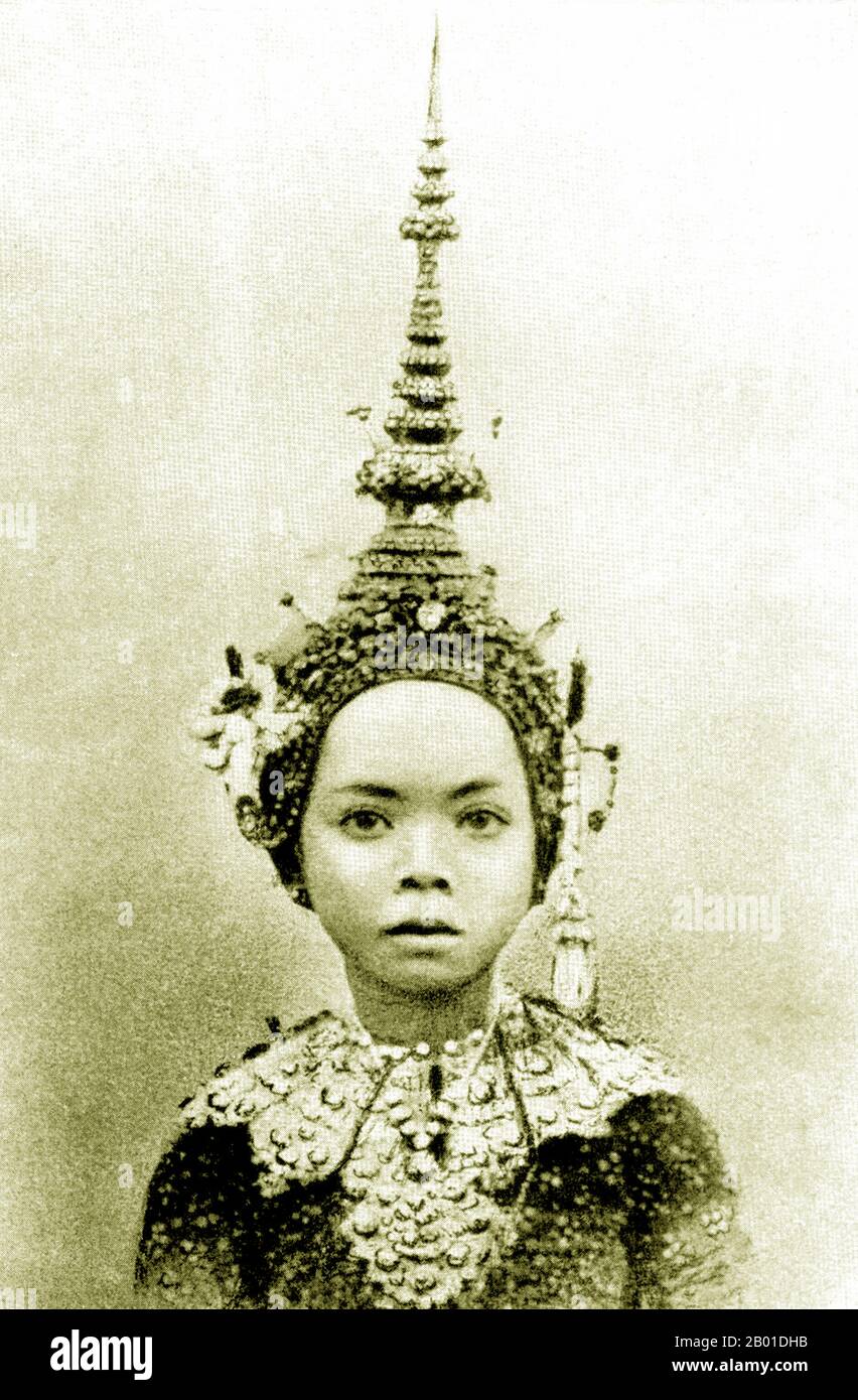 Cambodia: A young prima ballerina of the Cambodian Royal Ballet, Lycee Sisowath, 1915.  Khmer classical dance is a traditional form of dance in Cambodia which shares many similarities with classical dances of Thailand and Laos. The Cambodian form is known by various names in English, such as Khmer Royal Ballet and Cambodian Court Dance. Being a highly stylised art form performed primarily by females, Khmer classical dance, during the French protectorate era, was largely confined to the courts of royal palaces, performed by the consorts, concubines, relatives, and attendants of the palace. Stock Photo