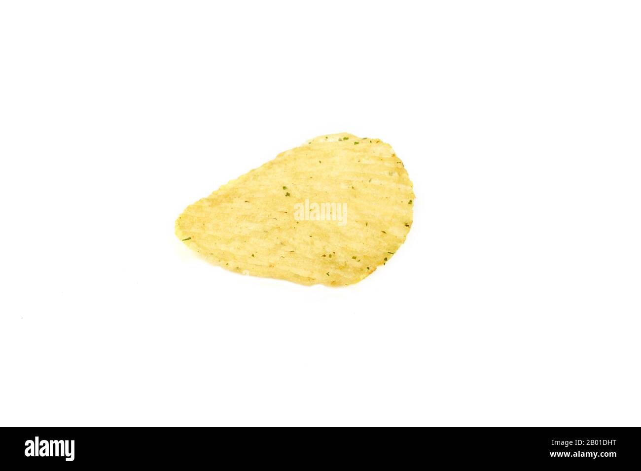 tasty ridged potato chips on white background. Stock Photo