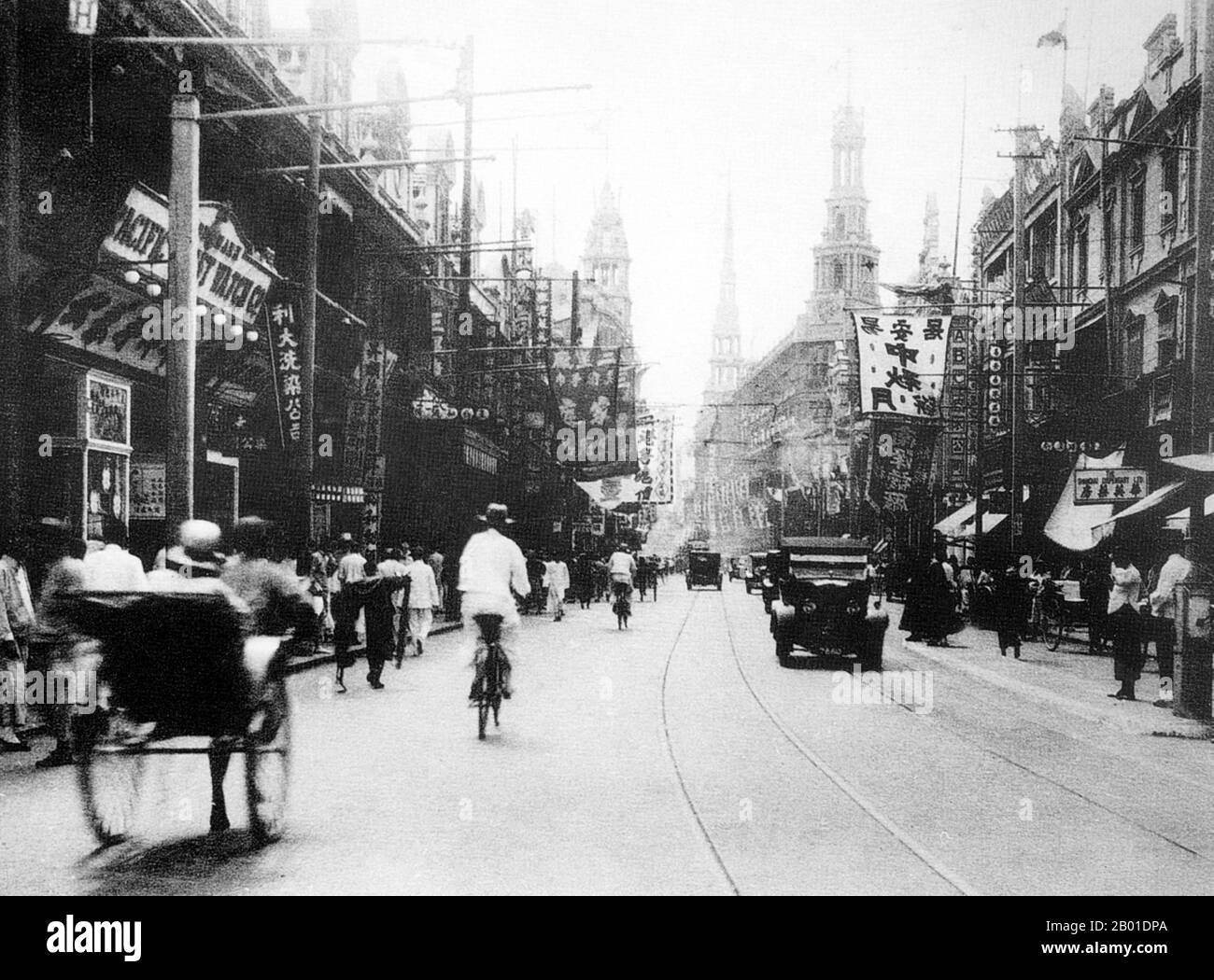 China: Shanghai's Nanjing Road in the early 20th century.  Nanjing Road (Chinese: 南京路; pinyin: Nánjīng Lù) is the main shopping street of Shanghai, China, and is one of the world's busiest shopping streets. Today's Nanjing Road comprises two sections, Nanjing Road East and Nanjing Road West.  In some contexts, 'Nanjing Road' refers only to what was pre-1945 Nanjing Road, today's Nanjing Road East, which is largely pedestrianised. Prior to 1949, the road's English name was rendered 'Nanking Road' using the standard Wade Giles romanization of the time. Stock Photo