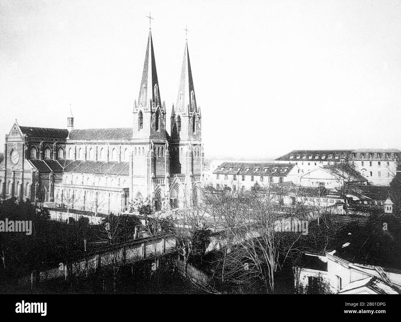 China: Shanghai's Xujiahui Cathedral (St Ignatius Cathedral) was built between 1906 and 1910.  Designed by English architect William Doyle, and built by French Jesuits between 1905 and 1910, it is said to have once been known as 'the grandest cathedral in the Far East.' It can accommodate 2,500 worshippers at the same time. In 1966, at the opening of the Cultural Revolution, Red Guards vandalised the cathedral, tearing down its spires and ceiling, and smashing its roughly 300 square metres of stained glass. For the next ten years the building served as a state-owned grain warehouse. Stock Photo
