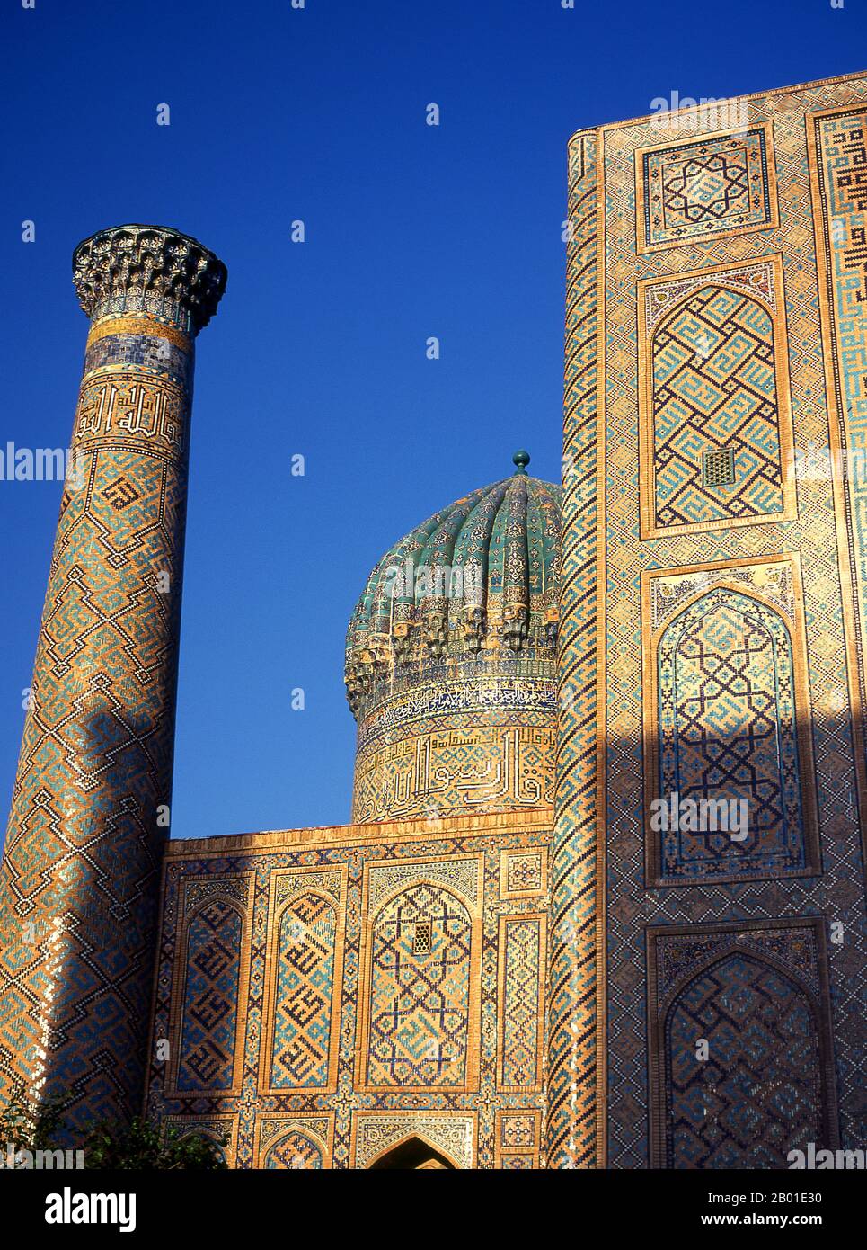 Uzbekistan: Minaret, fluted dome and portico at Sher Dor Madrassa, The Registan, Samarkand.  The Registan contains three madrasahs (schools), the Ulugh Beg Madrasah (1417–1420), Tilya-Kori Madrasah (1646–1660) and the Sher-Dor Madrasah (1619–1636).  In the 17th century the ruler of Samarkand Yalangtush Bakhodur ordered the construction of the Sher-Dor and Tillya-Kori madrasahs. The Sher-Dor (Having Tigers) Madrasah was designed by architect Abdujabor. The decoration of the madrasah is not as refined as that found on 15th century architecture, Samarkand's 'golden age'. Stock Photo