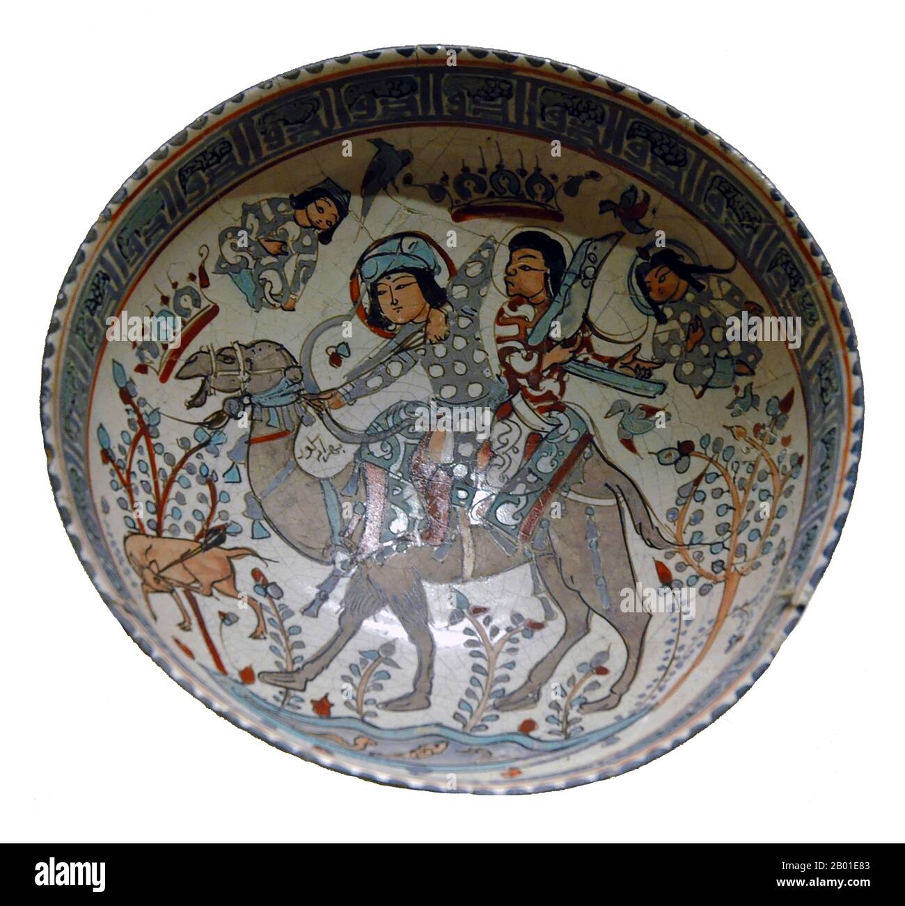 Iran/Persia: Bowl depicting Bahram Gur (400-438), hero of the Shahnameh (Book of Kings), and the harpist Azada, riding a Bactrian camel while hunting. Plate painting, 12th-13th century.  Bahram V was the fourteenth Sassanid Shahanshah (King of Kings) of Persia (r. 421-438). Also called Bahram Gur or Bahramgur, he was a son of Yazdegerd I, after whose sudden death (or assassination) he gained the crown against the opposition of the grandees by the help of Mundhir, the Arab dynast of al-Hirah.  Bahram Gur is a great favourite in Persian literature and poetry, with numerous legends to his name. Stock Photo