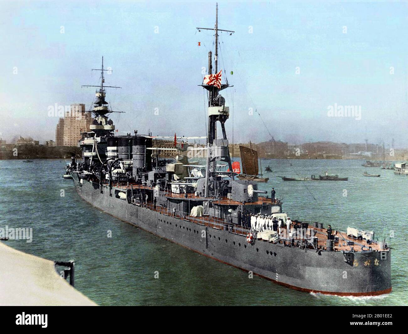 China: The Japanese cruiser Nagara on the Huangpu River, Shanghai. Broadway Mansions visible on the horizon, September 27, 1936  Nagara (長良 軽巡洋艦 Nagara keijun'yōkan) was the lead ship of her class of light cruiser in the Imperial Japanese Navy. She was named after the Nagara River in the Chūbu region of Japan.  The Nagara was the first vessel completed in the Nagara-class, and like other vessels of her class, she was intended for use as the flagship of a destroyer flotilla, and it was in that role that she participated in the invasions of the Philippines and the Netherlands East Indies. Stock Photo
