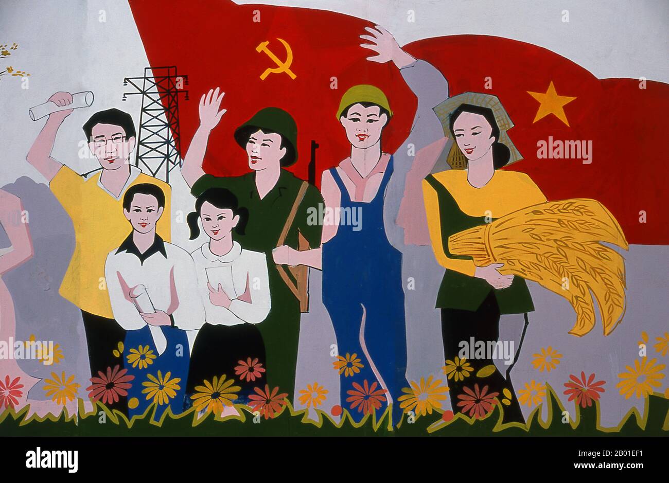 Vietnam: Revolutionary Socialist realist-style political hoardings can be seen in all corners of Vietnam.  Socialist realism is a style of realistic art which was developed in the Soviet Union and became a dominant style in other communist countries. Socialist realism is a teleologically-oriented style having its purpose the furtherance of the goals of socialism and communism. Although related, it should not be confused with social realism, a type of art that realistically depicts subjects of social concern. Unlike social realism, socialist realism often glorifies the roles of the poor. Stock Photo