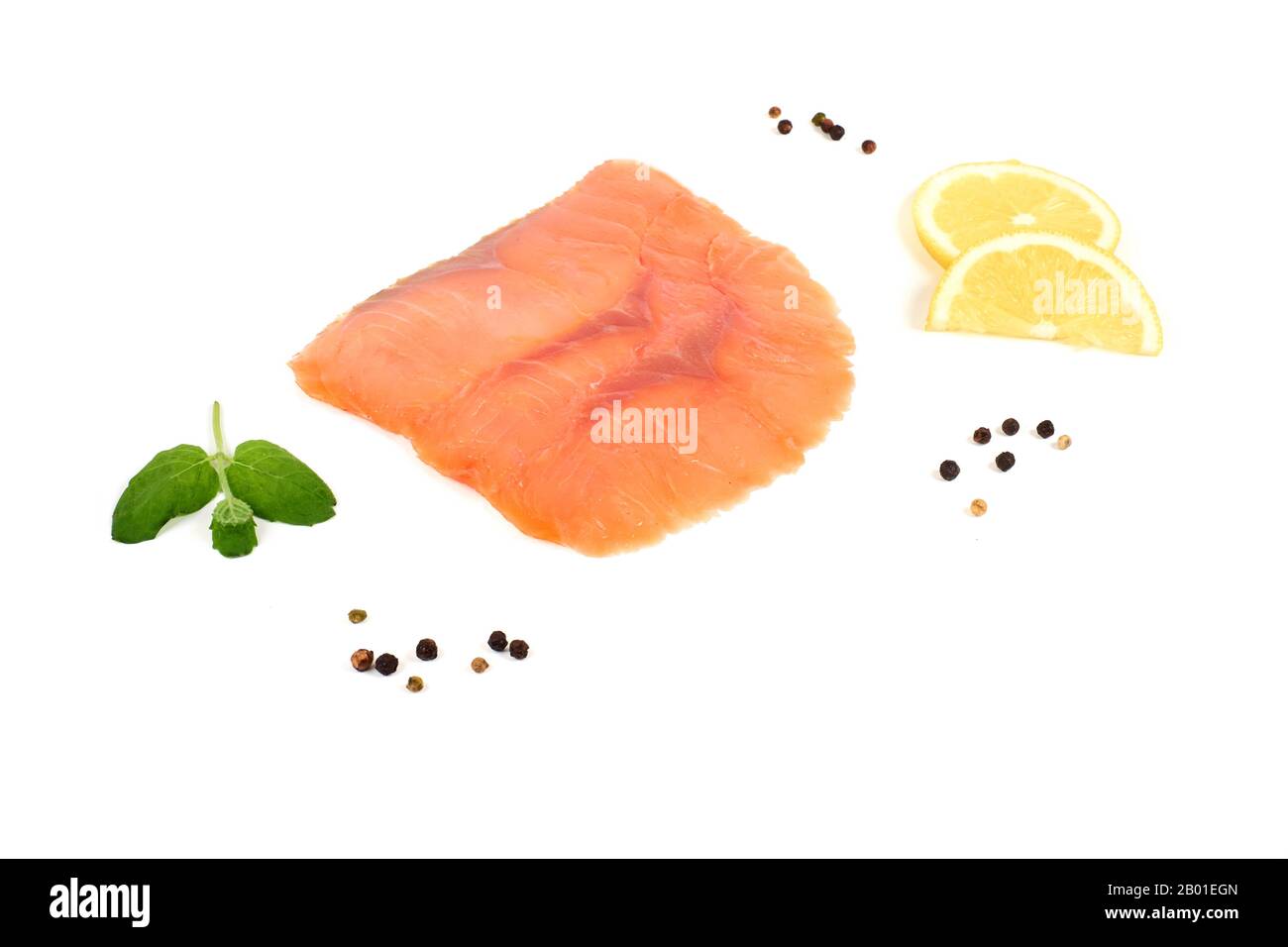 Three slices of salmon with lemon on white background Stock Photo - Alamy