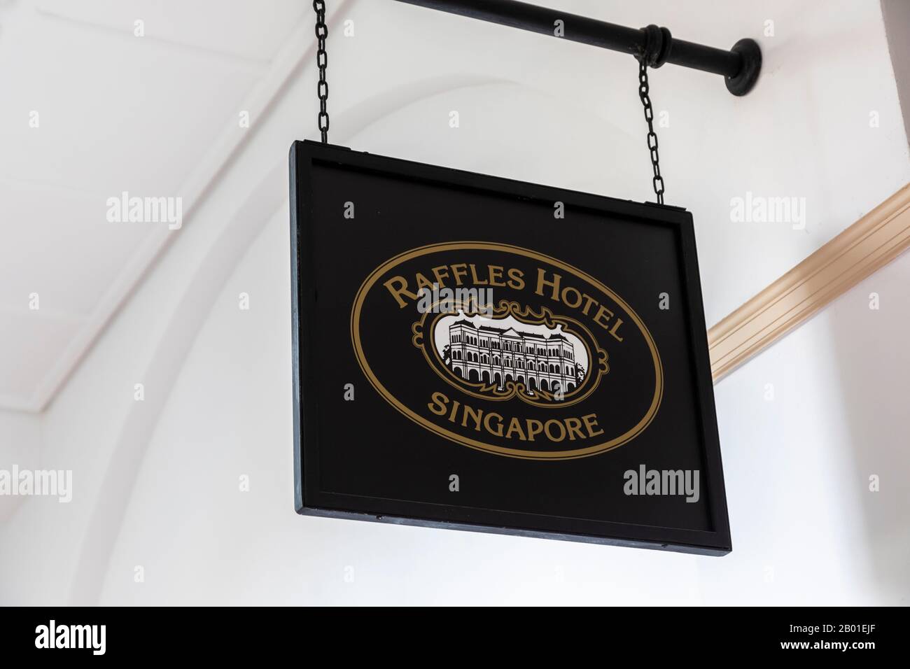 hanging sign for Raffles hotel, Singapore, Asia famous for the 1930's alcoholic cocktail a 'Singapore Sling' served in the Long Bar. Singapore, Asia Stock Photo