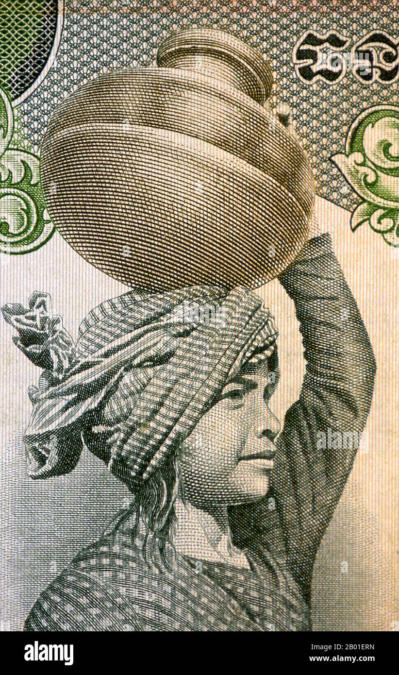 Cambodia: A woman with a krama wrapped around her head transports a pot (image on Cambodian banknote).  The krama, more than any other item of clothing of everyday use, is quintessentially Cambodian. No other country in Southeast Asia uses this scarf-like head-wrapping, and it’s arguably a sign of Cambodia’s ancient links with India, the land of turbans par excellence. Krama, which are made from cotton or silk, are most commonly found in red-and-white or blue-and-white check, and they have a considerable variety of uses.  Just about every province produces its own distinctive krama pattern. Stock Photo