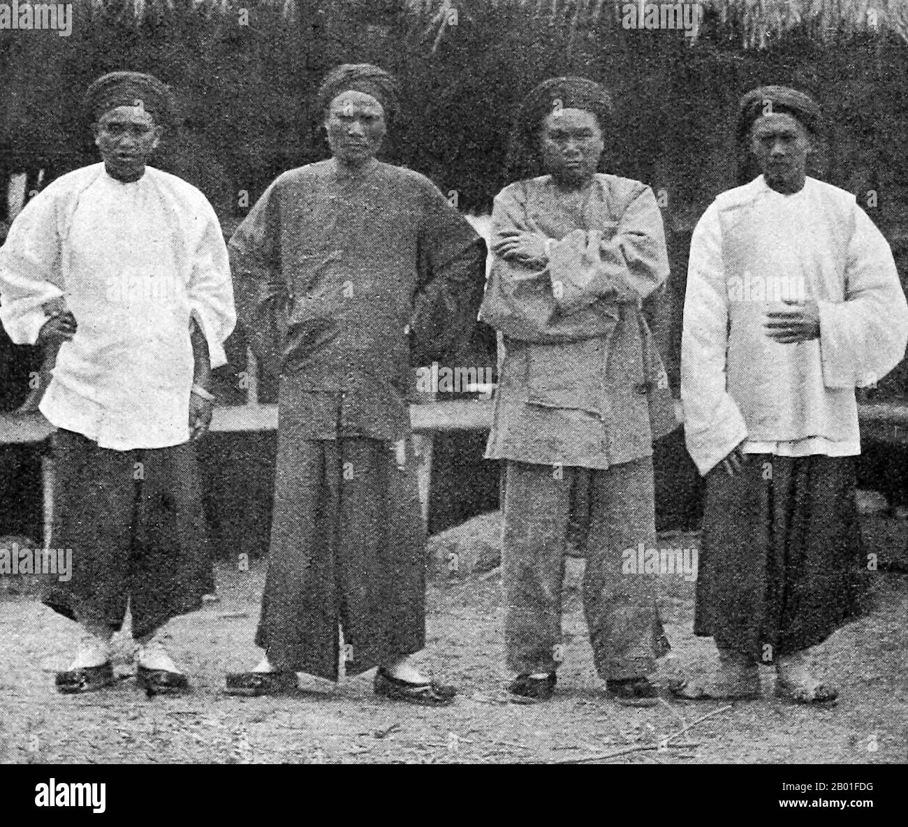 Vietnam: Deo Van Tri (Kham Oun), Lord of the Tai Federation of Sipsongchuthai (1849-1908) second left, with other White Tai leaders, c. 1890s.  During the late 19th century, all the territory stretching from Dien Bien Phu in the south to the Chinese frontier in the north formed an autonomous region called Sipsongchutai, or ‘Twelve Tai Principalities’. It was ruled over by a hereditary White Tai prince from his capital at Lai Chau and paid tribute, at one time or another, to Siam, Vietnam or China, and sometimes to all three. Stock Photo
