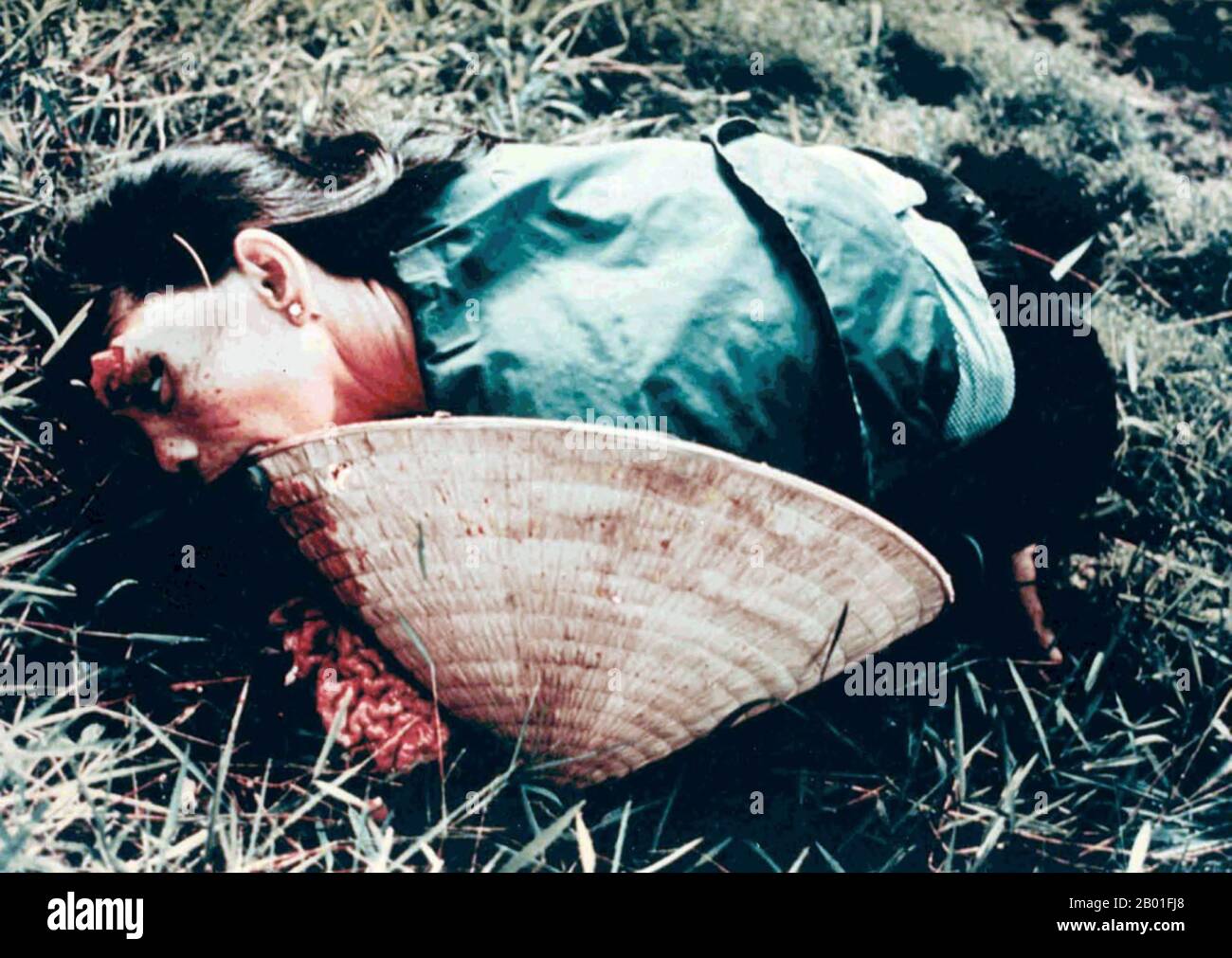 Vietnam: A female victim of the My Lai massacre or Thảm sát Mỹ Lai, March 6, 1868. Photo by Sgt. Ronald L. Haeberle.  The My Lai Massacre was the Vietnam War mass murder of 347–504 unarmed civilians in South Vietnam on March 16, 1968, by United States Army soldiers of 'Charlie' Company of 1st Battalion, 20th Infantry Regiment, 11th Brigade of the Americal Division.  Most of the victims were women, children (including babies), and elderly people. Many were raped, beaten, and tortured, and some of the bodies were later found to be mutilated. Stock Photo