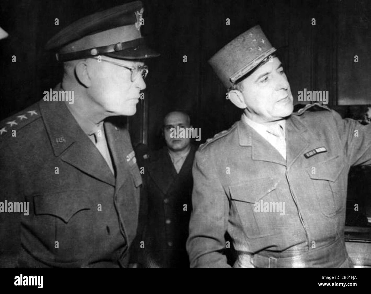 France/Vietnam: General Jean de Lattre de Tassigny with General  Dwight D. Eisenhower at the end of World War II, 1944.  General Jean de Lattre de Tassigny was a French military hero and commander in the First Indochina War.  Having fought in the First World War and Rif War (Second Moroccan War), de Tassigny (nickname: 'Roi Jean') was a hero of the Free French in World War II. Later, he commanded French troops in Indochina during the First Indochina War. He won three major victories at Vinh Yen, Mao Khe and Yen Cu Ha and successfully defended the north of the country against the Viet Minh. Stock Photo
